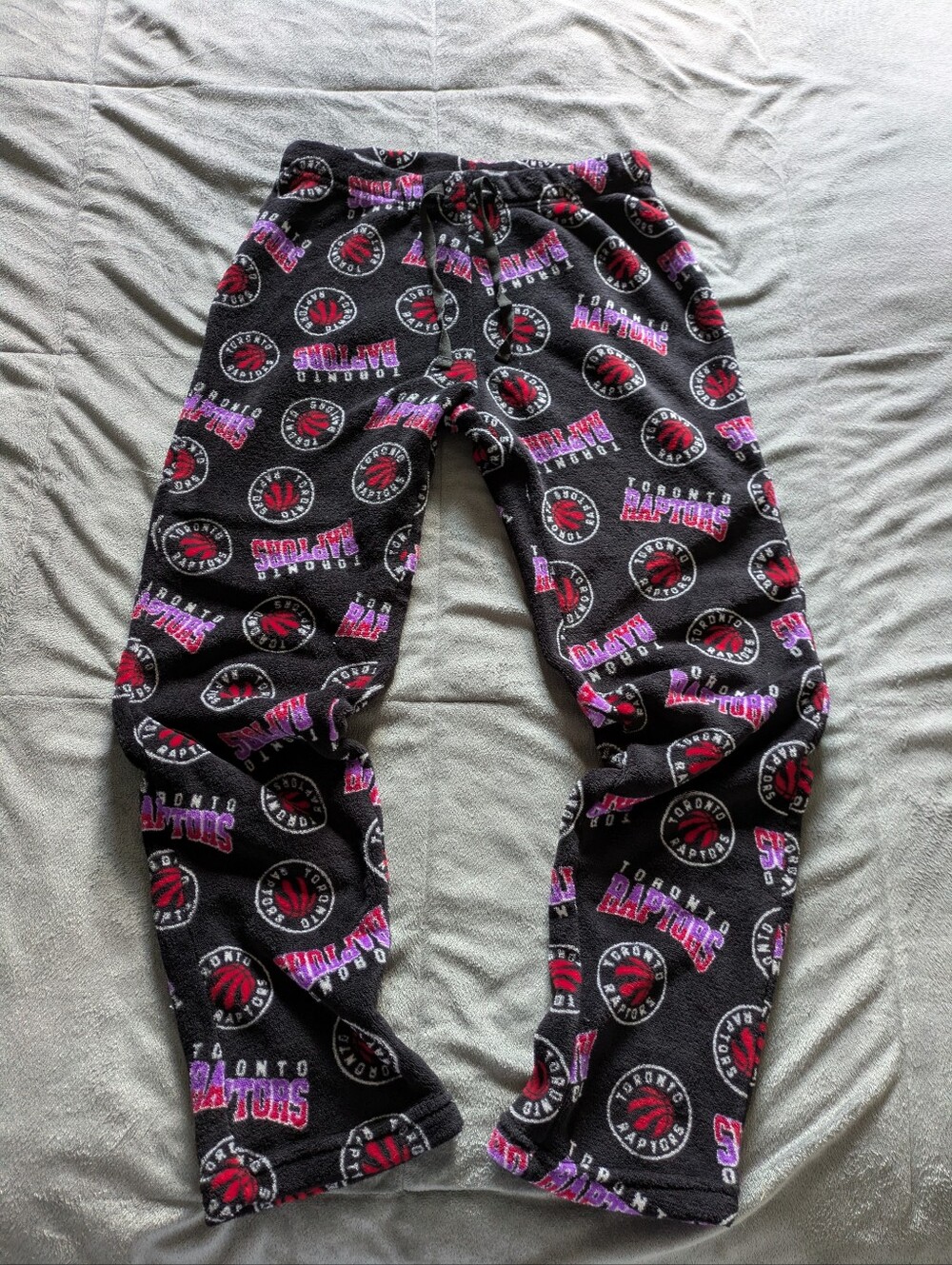 NBA Kids Black Pajama Pants with Red & Pink Raptors Logos.